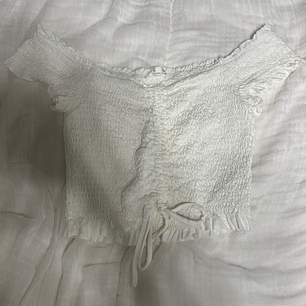 i am selling this white ribbed top! I bought it for vacation and it was so cute!